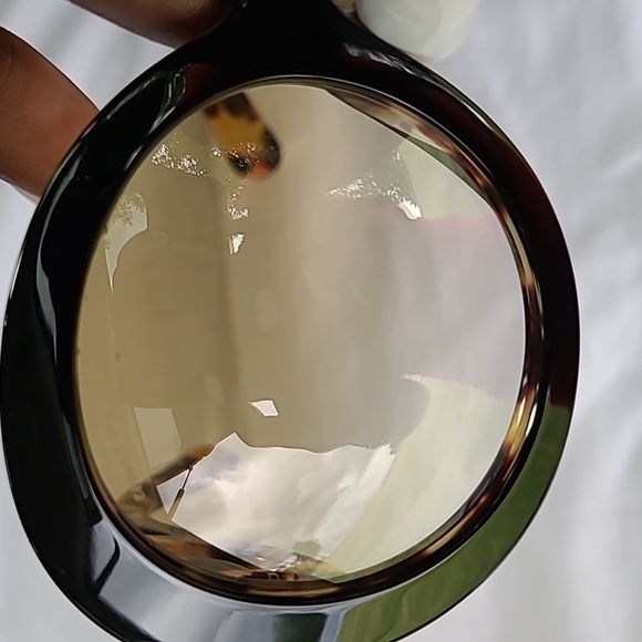 Leopard Print Prada Sunglasses are exquisite to taste! Very classy and stylish. - Picture 5 of 13